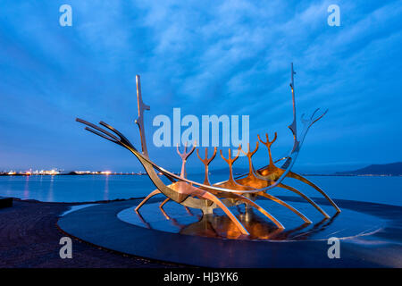 Solfar Sun Voyager metal Viking ship in Reykjavik, Iceland facing the harbor waterfront. Stock Photo