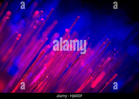 defocused abstract background of fiber optic cables Stock Photo