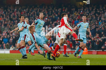 Ben Mee of Burnley fouls Arsenal’s Laurent Koscielny for a penalty in added time during the Premier League match between Arsenal and Burnley at the Emirates Stadium in London. January 22, 2017.  EDITORIAL USE ONLY Stock Photo