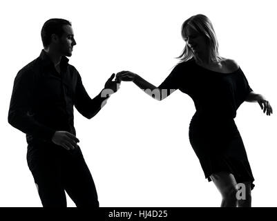 one caucasian couple woman man dancing dancers salsa rock  in silhouette studio isolated on white background Stock Photo