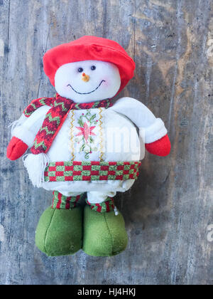 Christmast toys hanging on the wooden wall. Stock Photo