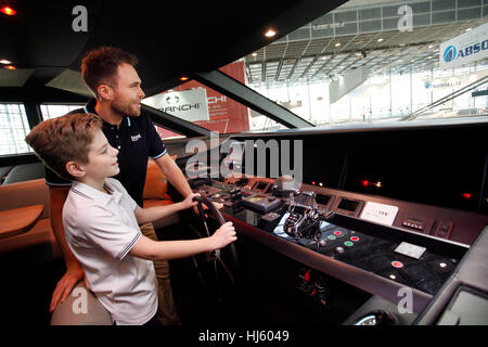 Dusseldorf, Germany. 20th January, 2017. boot Duesseldorf 2017 - the worlds biggest yachting and water sports exhibition. Star is the super yacht Princess 30M. It is the largest and most expensive yacht at the fair. Stefan and Daniel (11) in the wheelhouse. Stock Photo