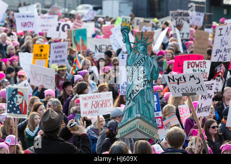 Seattle, United States. 21st Jan, 2017. Seattle, Washington: Supporters pass through Pioneer Square. Over 100,000 people attended the Womxn's March on Seattle on January 21, 2017 in solidarity with the national Women's March on Washington, DC The mission of the silent march is to bring diverse women together for collective action. Credit: Paul Gordon/Alamy Live News Stock Photo