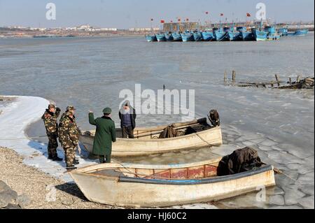 Qingdao, Qingdao, China. 22nd Jan, 2017. Qingdao, CHINA-January 22 2017: (EDITORIAL USE ONLY. CHINA OUT) . As the temperature dropped sharply in Qingdao, the sea ice stretched for more than 10 kilometers, making some fishing boats stranded in the frozen water at Jiaozhou Bay. Credit: SIPA Asia/ZUMA Wire/Alamy Live News Stock Photo