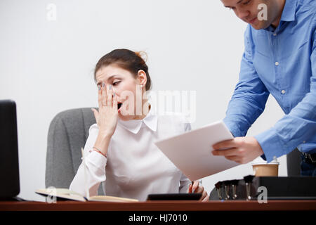 Young guy came to boss Stock Photo