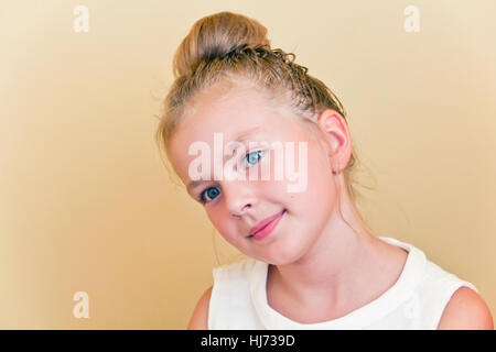 Cute girl with blond long hair and blue eyes Stock Photo