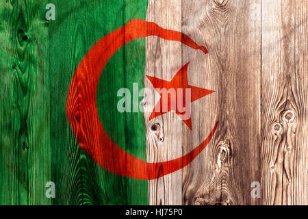 National flag of Algeria on wooden background Stock Photo