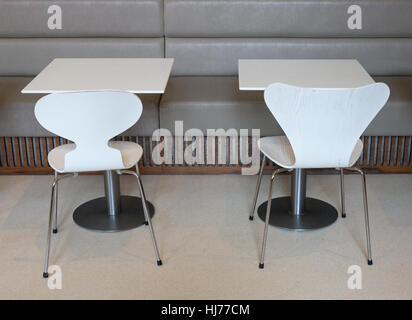 Empty chairs and tables in café, London, UK Stock Photo