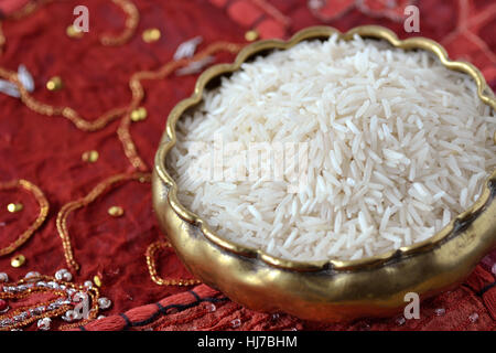 Basmati rice over indian carpet