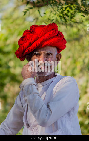 Rajasthani senior man wearing red turban Stock Photo