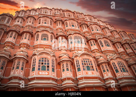 Hawa Mahal - a five-tier harem wing of the palace complex of the Maharaja of Jaipur, built of pink sandstone in the form of the crown of Krishna Stock Photo