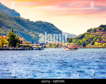 View of the Lake Iseo, colorful summer morning. Region Lombardy, Province Brescia (BS) in Iseo Lake. Italy, Europe. Stock Photo