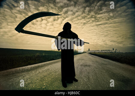 Grim Reaper on the road Stock Photo
