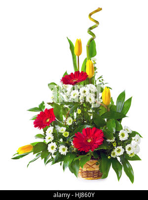 Bright flower bouquet in basket isolated over white background Stock Photo