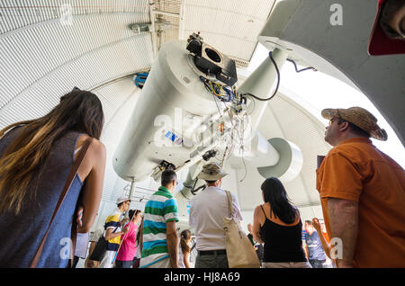 TENERIFE, SPAIN - JULY 3: Tourist visiting telescopes at interior of Teide astronomical observatory  on July 3, 2015 in Tenerife, Canary Island, Spain Stock Photo