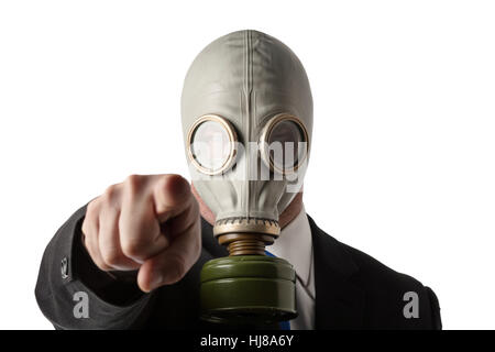 business man wearing a old gas mask Stock Photo