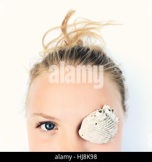 Portrait of a girl with a shell on her eye Stock Photo