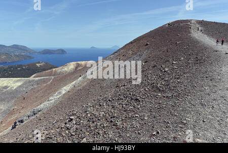 Walking around the Gran Cratere on Vulcano, one of the Aeolian Islands off Sicily Stock Photo