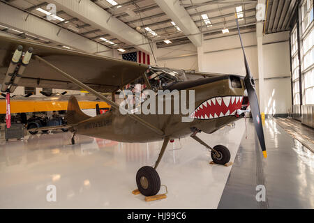 Santa Ana, CA, USA - January 21, 2017: Army green Cessna O-1E airplane called birddog displayed at the Lyon Air Museum in Santa Stock Photo