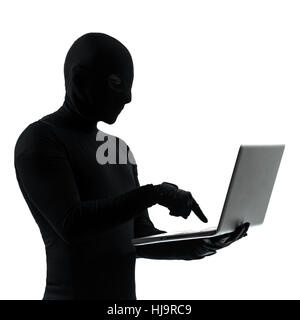 thief criminal computer hacker  in silhouette studio isolated on white background Stock Photo
