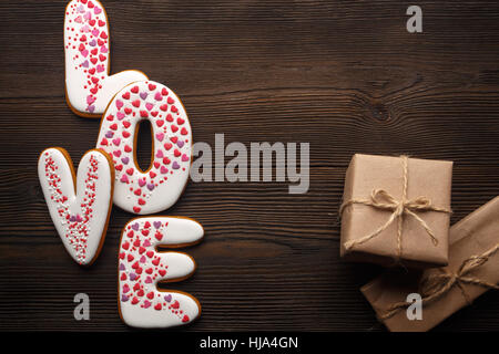 Gingerbreads hearts and little boxes for Valentines day. Stock Photo