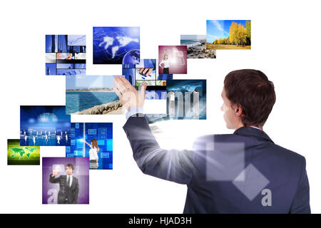 Man working with vurtial screens with different images Stock Photo