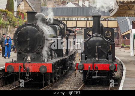 Left. Steam Locomotive Ex BR 49395 Class 'Super D' LNWR Class G2 7F 0-8-0 freight engine. Right 58926 LMS Webb Coal Tank 0-6-2T tank engine At Llangol Stock Photo