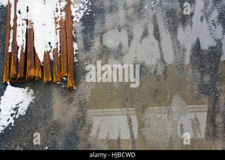 Rusty wire as a texture of old metal coil iron bars Stock Photo