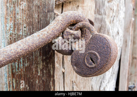 Macro view of very old rusty padlock. Stock Photo