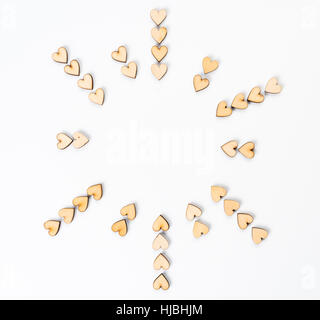 Circle of wooden hearts with copy space on white background Stock Photo
