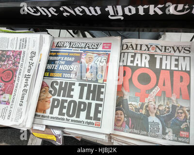 New York newspapers report on the previous day's Women's March on Sunday, January 22, 2017. Stock Photo