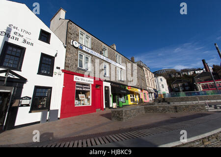 Town of Oban, Scotland. Picturesque colourful view of retail shops cafes and pubs at Oban’s Stafford Street. Stock Photo