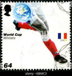 UNITED KINGDOM - CIRCA 2006: A used postage stamp from the UK, issued to commemorate past Football World Cup Winners France, circa 2006. Stock Photo