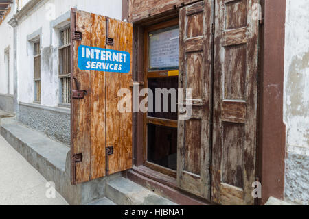 Stone Town, Zanzibar, Tanzania- October 2016:Internet usage is becoming more common in poor parts of Africa like Zanzibar. Local people are gaining ac Stock Photo