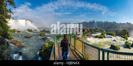 Foz do Iguacu, Brazil - july 9, 2016: Close view of one of the Cataratas water falls under blue sky and a lot of water mist in the air at the Foz do I Stock Photo