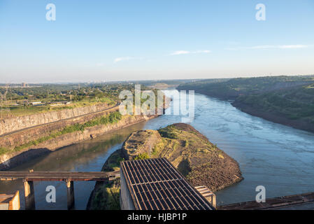 Foz do Iguazu, Brazil - july 8, 2016: View from the top of Itaipu dam park on a touristic bus at the brazilian border. Stock Photo