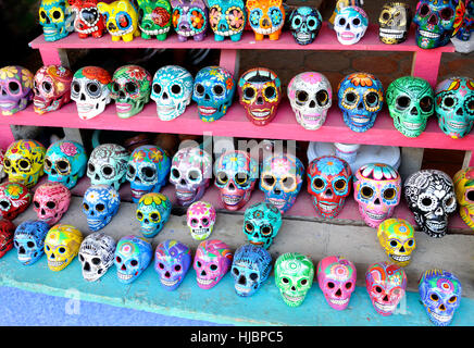 Painted skulls in a shop window, Sayulita, Mexico. Stock Photo