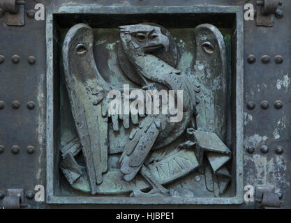 Eagle of Saint John. Detail of the bronze gate to the Basilica de la Santa Cruz (Basilica of the Holy Cross) in the Valle de los Caidos (Valley of the Fallen) near Madrid, Spain. Stock Photo