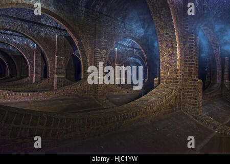 Atmospheric Finsbury Park Underground Reservoir, North London. The Victorian brick built structure was created between 1868 and 1869 Stock Photo