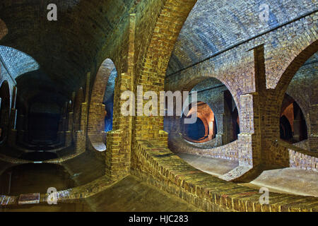 Atmospheric Finsbury Park Underground Reservoir, North London. The Victorian brick built structure was created between 1868 and 1869 Stock Photo