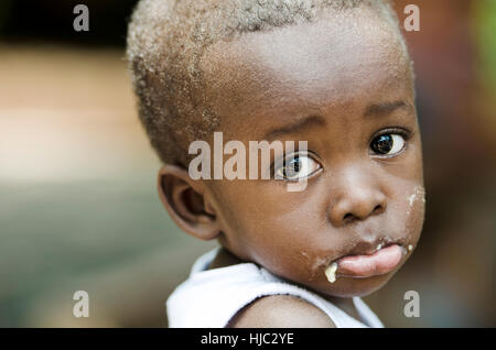 Sadness Despair Depression Symbol: Little African Black Boy Crying Sadly in Bamako, Mali Stock Photo