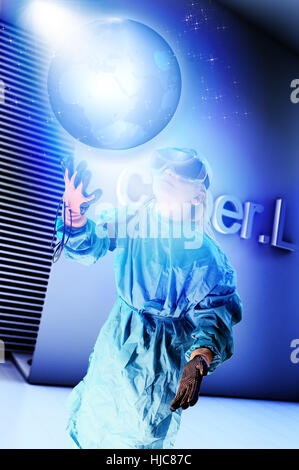 Girl in virtual reality headset interacting with digital floating planet earth Stock Photo