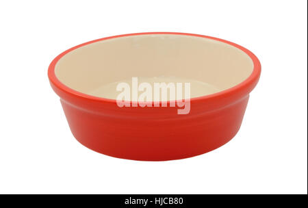 Red empty pet food bowl, isolated on a white background Stock Photo