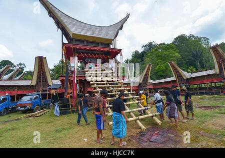 Tana Toraja, Sulawesi, Indonesia - August 15: Funeral ceremony on August 15, 2016 in Tana Toraja, Sulawesi, Indonesia. Stock Photo