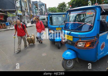 Jakarta, Java, Indonesia - August 25: Public transport tuk tuk' wait for passengers on August 25, 2016 in Jakarta, Java. Stock Photo