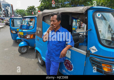 Jakarta, Java, Indonesia - August 25: Public transport tuk tuk' wait for passengers on August 25, 2016 in Jakarta, Java. Stock Photo