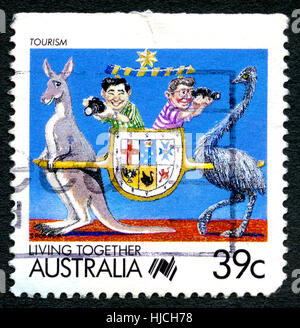 AUSTRALIA - CIRCA 1988: A postage stamp from Australia, promoting Living together and celebrating Tourism in Australia. Stock Photo