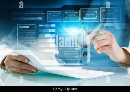 Analyzing statistics data . Mixed media Stock Photo