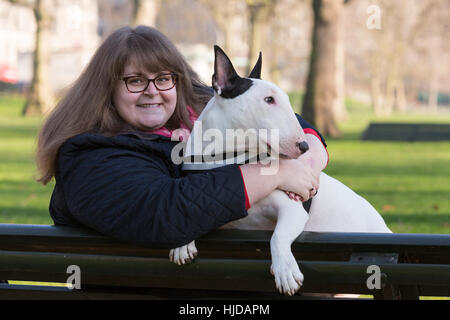 London, UK. 24th Jan, 2017. Bowser, the Bull Terrier, with owner Sally Degan, 26, from Scunthorpe, Lincs. The Kennel Club and Eukanuba have selected four inspiring Hero Dogs as the 2017 finalists. They forward to the public vote with the winner being announced at Crufts. Credit: Vibrant Pictures/Alamy Live News Stock Photo