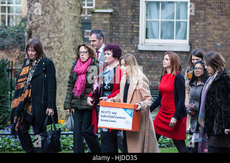 London, UK. 24th January, 2017. Claire Throssell, whose children were killed by her abusive ex-husband in 2014, arrives at Downing Street with campaigners and Labour MP Jess Phillips to present a Child First petition signed by over 40,000 38 Degrees supporters at 10 Downing Street. Child First calls for an end to unsafe child contact with dangerous perpetrators of domestic violence through the family court process. Credit: Mark Kerrison/Alamy Live News Stock Photo